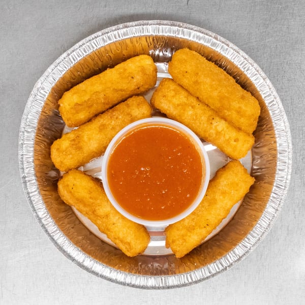 Golden-brown mozzarella sticks arranged in a circle around a cup of marinara sauce in a foil container.